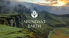 abundant-earth-logo-with-scottish-highlands-landscape-and-sunset